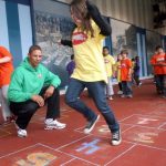 Kids Playing Hopscotch