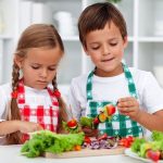 kids preparing veg salad