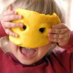 Kid Playing with playdough