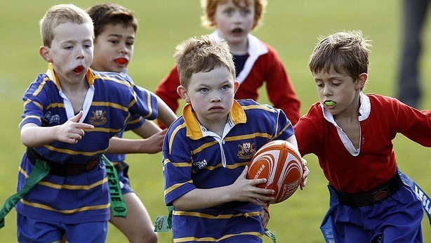 Kids playing Rugby