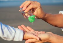 child-using-hand-sanitizer
