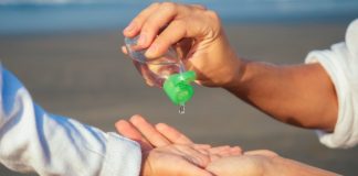 child-using-hand-sanitizer